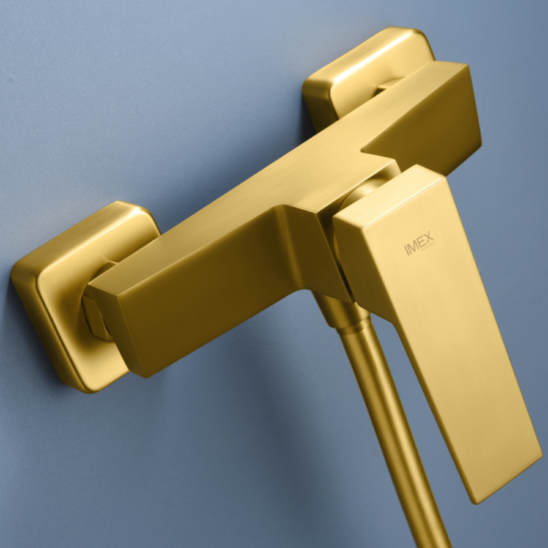 Grifería de ducha monomando acabado oro cepillado serie Art.